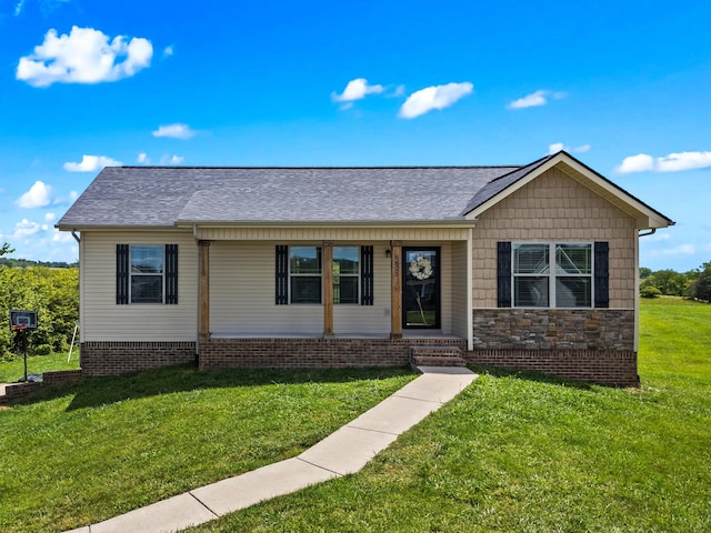 6625 Lainey Jane Ct, Whitesburg, TN 37891 - view of front of house featuring a front lawn, a shingled roof, and stone siding