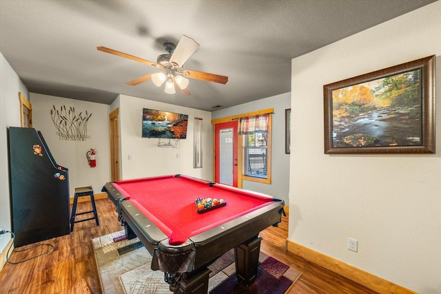 recreation room with hardwood / wood-style flooring, billiards, and ceiling fan