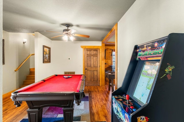 rec room featuring dark wood-type flooring, ceiling fan, and pool table