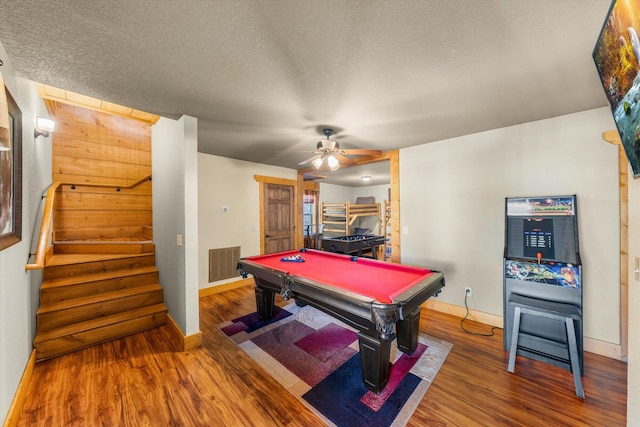 recreation room featuring hardwood / wood-style floors, billiards, a textured ceiling, and ceiling fan