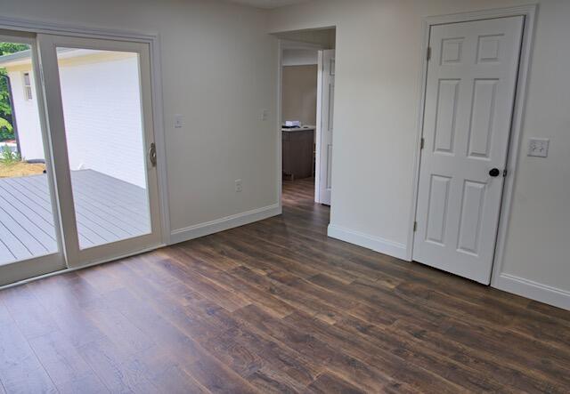 3646 Falcon Rd, Morristown, TN 37814 - empty room featuring dark wood finished floors and baseboards