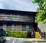1081 Cove Rd Unit 734, Sevierville, TN 37876 - view of building exterior with uncovered parking