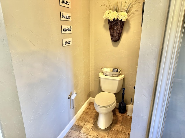 bathroom featuring toilet