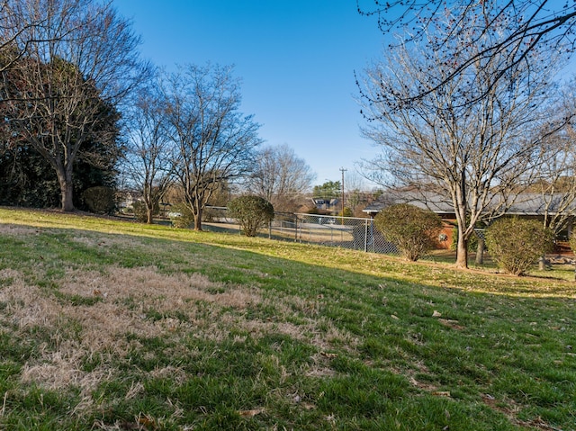 view of yard with fence