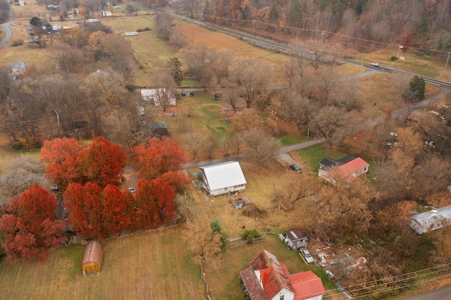 birds eye view of property featuring a rural view