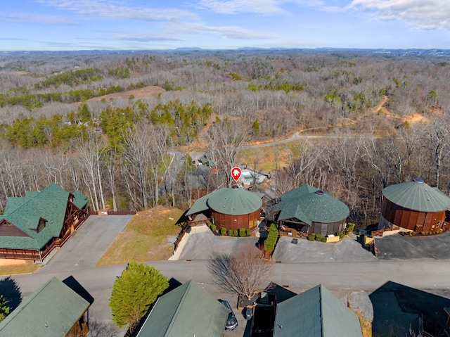 bird's eye view featuring a view of trees