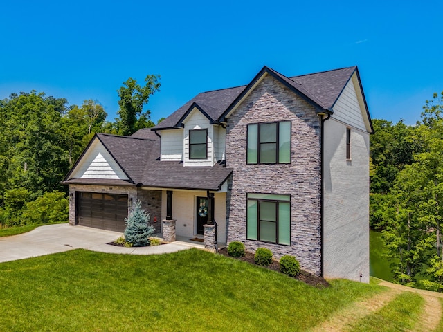 3099 Bridgewater Blvd, Morristown, TN 37814 - view of front of property with stone siding, an attached garage, driveway, and a front yard