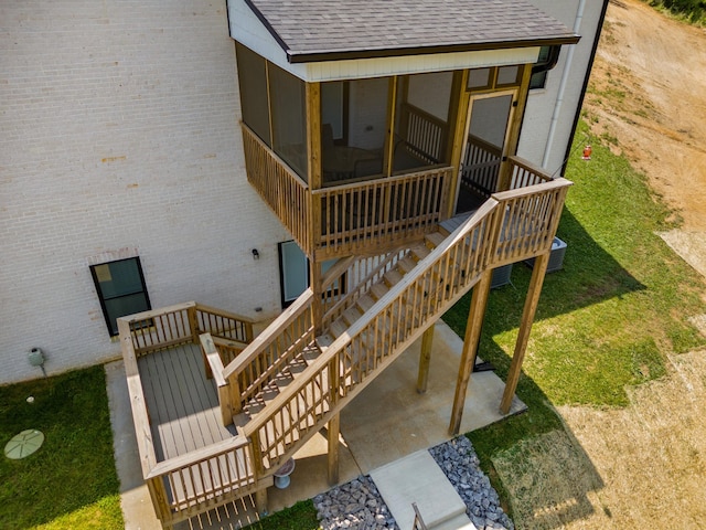 3099 Bridgewater Blvd, Morristown, TN 37814 - deck featuring stairway, a sunroom, and a patio area