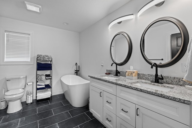 3099 Bridgewater Blvd, Morristown, TN 37814 - bathroom featuring double vanity, a soaking tub, toilet, tile patterned flooring, and baseboards