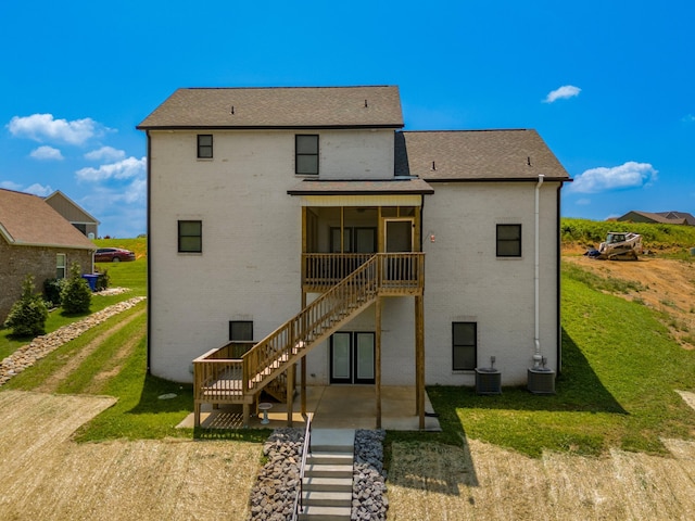 3099 Bridgewater Blvd, Morristown, TN 37814 - rear view of property featuring stairway, brick siding, a patio area, and central AC