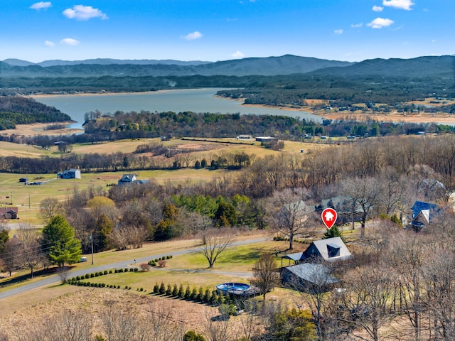 bird's eye view featuring a rural view and a water and mountain view