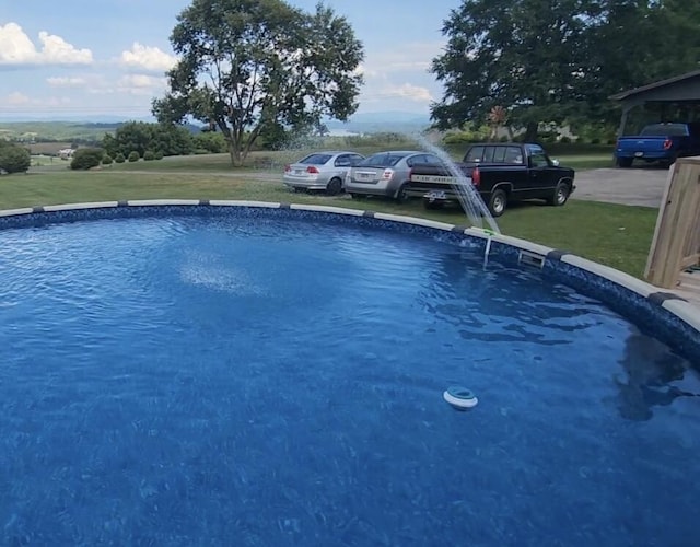 pool featuring a yard