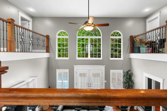 detailed view of a ceiling fan and recessed lighting