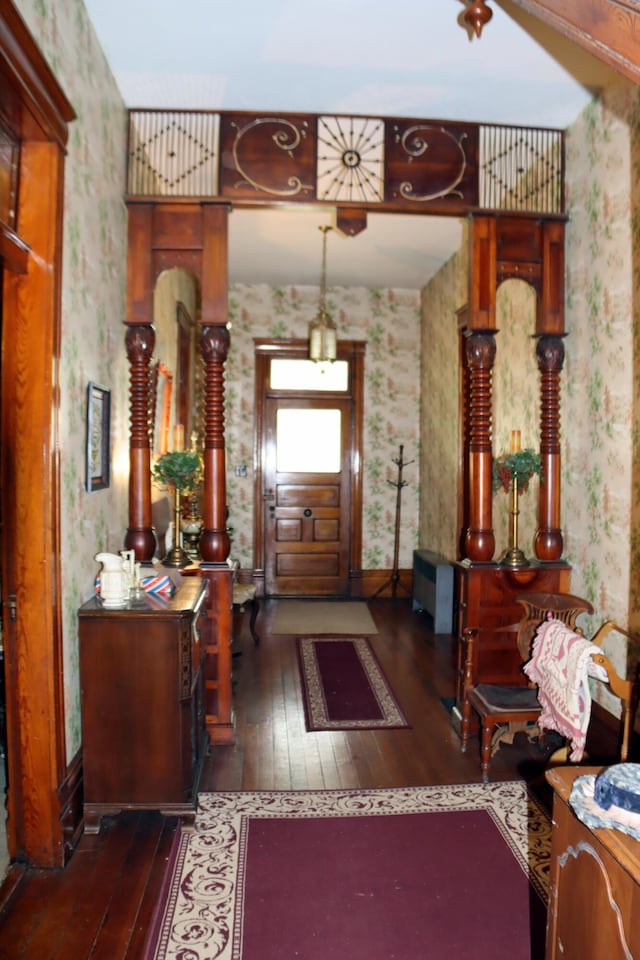 foyer with dark hardwood / wood-style flooring