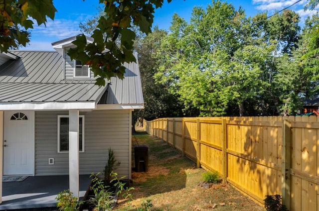 view of side of home featuring a patio