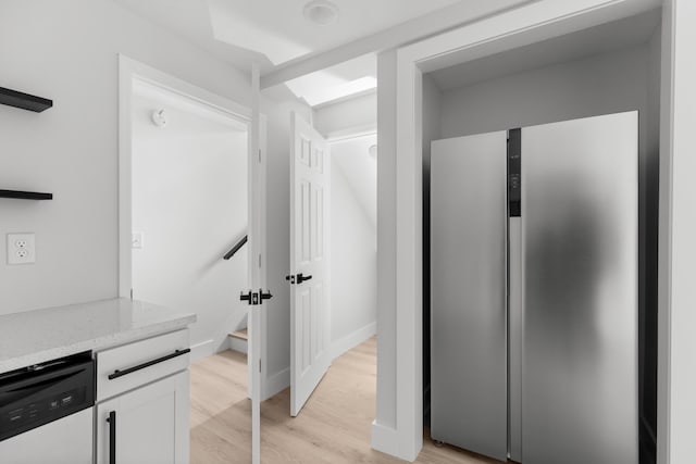 bathroom with hardwood / wood-style floors