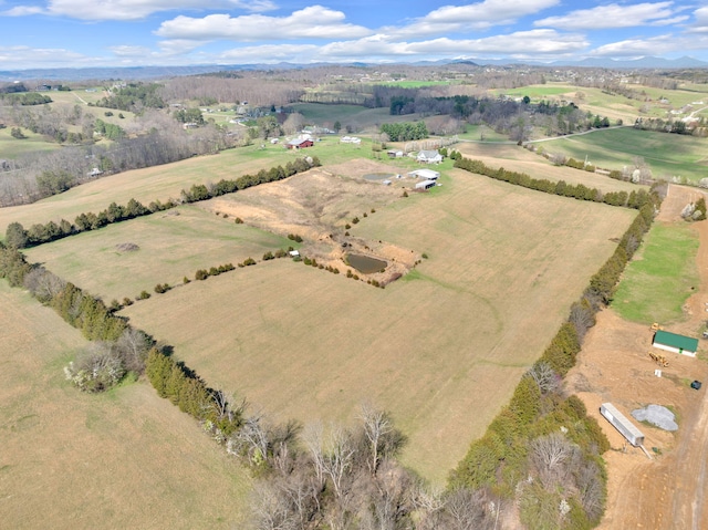 birds eye view of property featuring a rural view