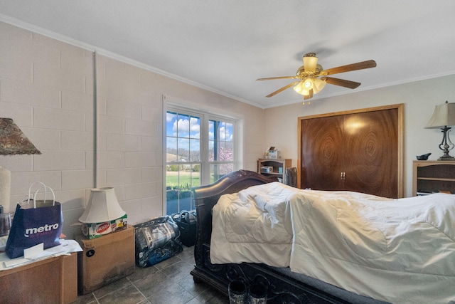 bedroom featuring ceiling fan and ornamental molding