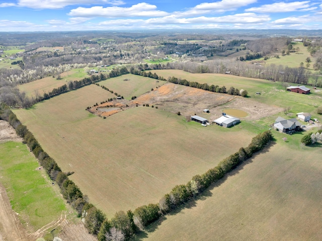 birds eye view of property featuring a rural view