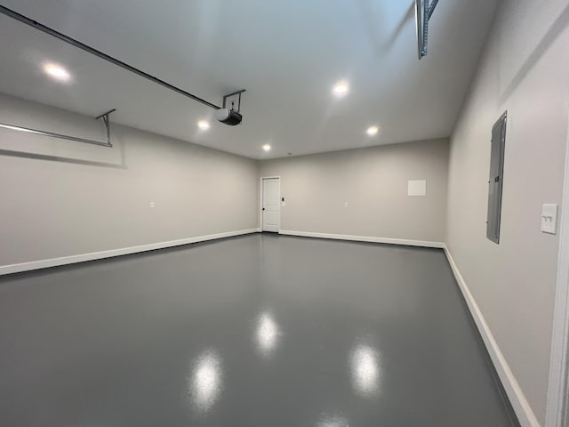 536 Sequoyah Dr, Morristown, TN 37813 - garage with a garage door opener, recessed lighting, electric panel, and baseboards