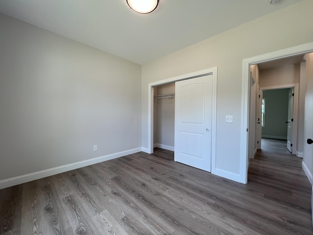 536 Sequoyah Dr, Morristown, TN 37813 - unfurnished bedroom featuring wood finished floors, baseboards, and a closet