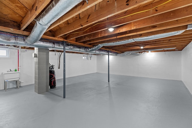 basement featuring a sink