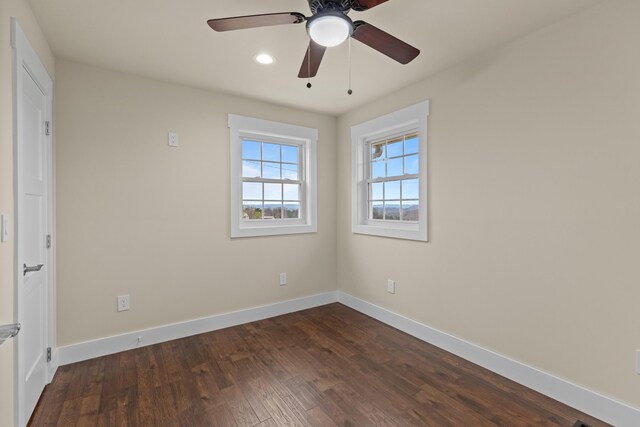 empty room featuring baseboards, dark wood-style floors, recessed lighting, and ceiling fan