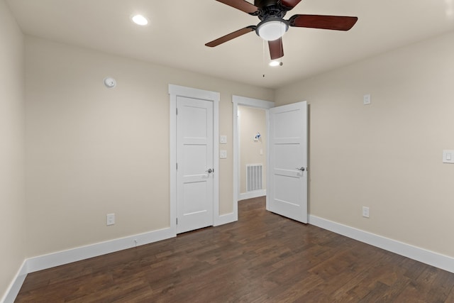 unfurnished bedroom featuring dark wood-style floors, baseboards, visible vents, ceiling fan, and recessed lighting