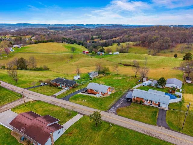 bird's eye view with a mountain view and a rural view