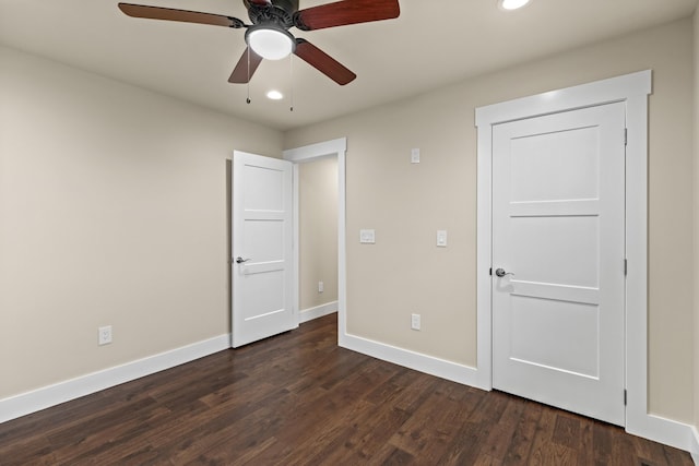 unfurnished bedroom featuring baseboards, dark wood-style floors, recessed lighting, and a ceiling fan