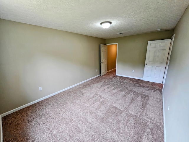 269 Buttercup Fields Rd, Newport, TN 37821 - unfurnished bedroom with a textured ceiling, carpet floors, and baseboards