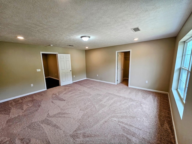 269 Buttercup Fields Rd, Newport, TN 37821 - empty room with carpet floors, baseboards, a textured ceiling, and recessed lighting