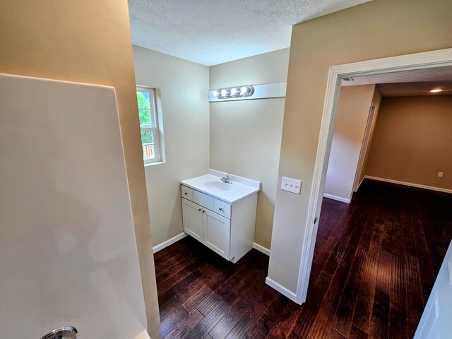 269 Buttercup Fields Rd, Newport, TN 37821 - bathroom with hardwood / wood-style floors, baseboards, vanity, and a textured ceiling