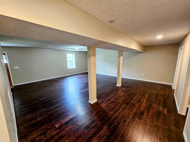 269 Buttercup Fields Rd, Newport, TN 37821 - basement with hardwood / wood-style floors, baseboards, and a textured ceiling