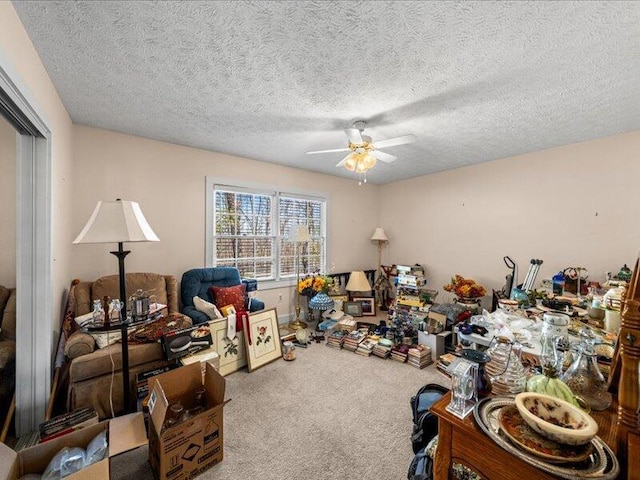 702 John Sevier Dr, Sevierville, TN 37876 - carpeted living room with a ceiling fan and a textured ceiling