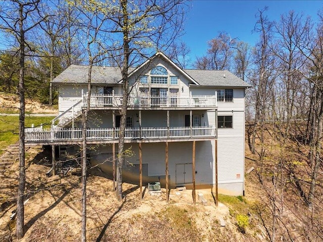 702 John Sevier Dr, Sevierville, TN 37876 - rear view of house with a wooden deck