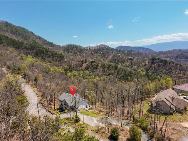 702 John Sevier Dr, Sevierville, TN 37876 - drone / aerial view featuring a mountain view and a view of trees
