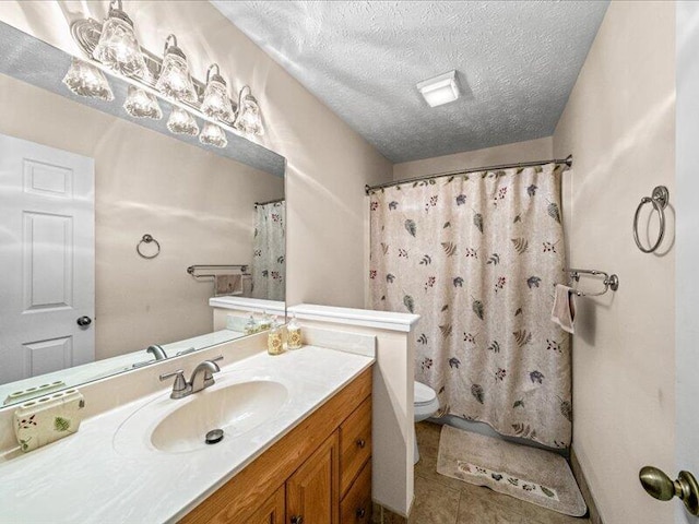 702 John Sevier Dr, Sevierville, TN 37876 - bathroom featuring vanity, tile patterned flooring, a textured ceiling, a shower with curtain, and toilet