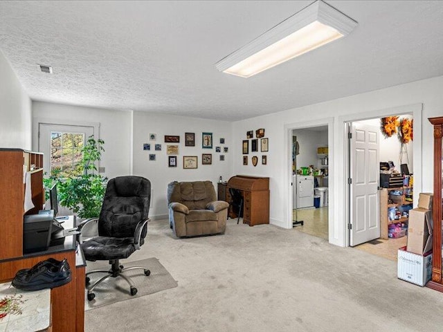 702 John Sevier Dr, Sevierville, TN 37876 - office featuring washing machine and dryer, baseboards, visible vents, and carpet floors