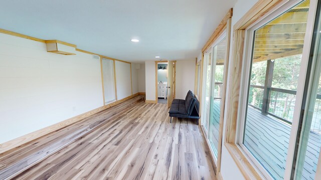 unfurnished room with light hardwood / wood-style floors