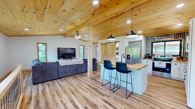 kitchen featuring pendant lighting, wood counters, white cabinetry, stainless steel appliances, and wood ceiling