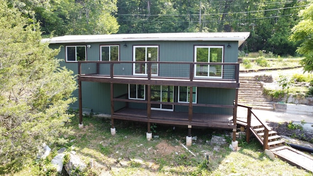 back of property with a deck