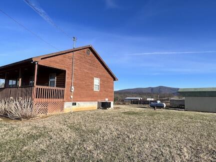 515 Mountain Lake Way, Newport, TN 37821 - view of side of home with cooling unit, a mountain view, and a porch