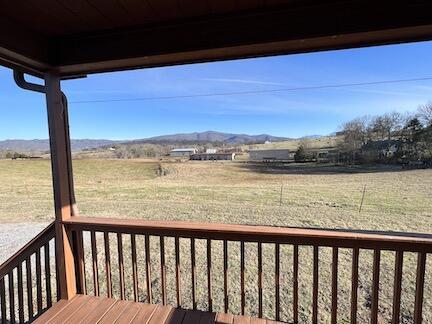 515 Mountain Lake Way, Newport, TN 37821 - wooden deck with a lawn