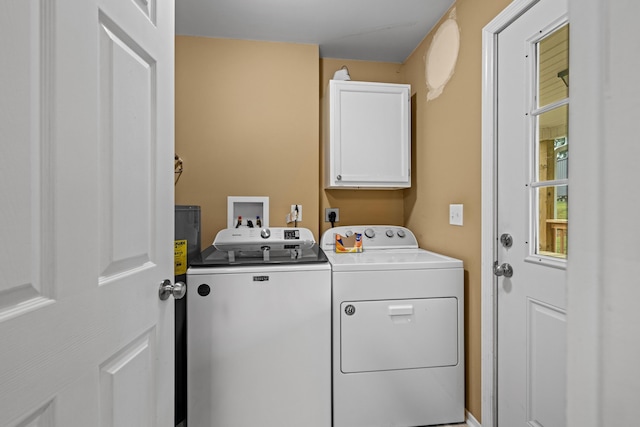 1400 Lakeview Cir, Morristown, TN 37814 - washroom with cabinet space and washer and clothes dryer
