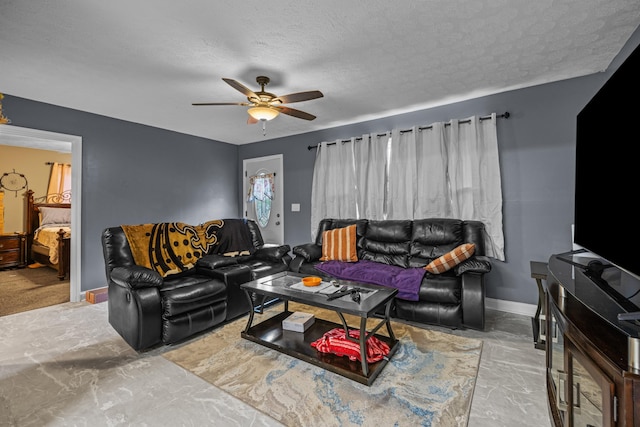 1400 Lakeview Cir, Morristown, TN 37814 - living room with ceiling fan and a textured ceiling