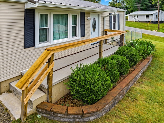 1400 Lakeview Cir, Morristown, TN 37814 - property entrance with a metal roof and a lawn