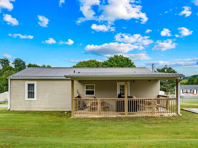 1400 Lakeview Cir, Morristown, TN 37814 - rear view of house with a lawn and a metal roof