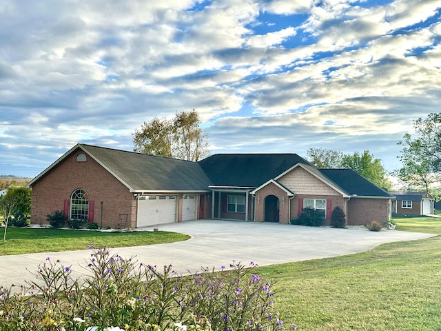 ranch-style house with a front yard and a garage