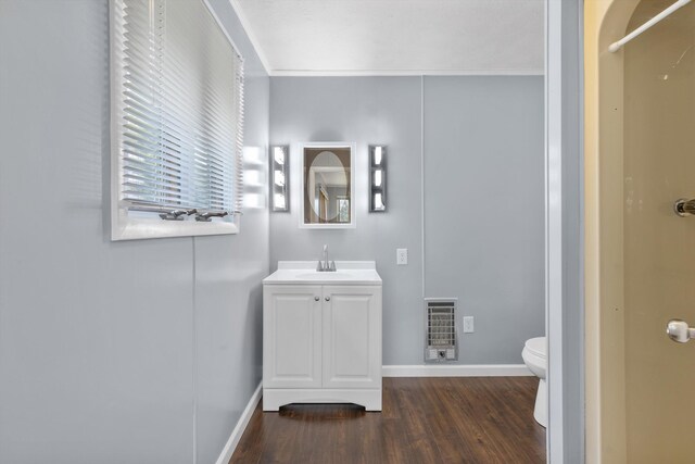 209 Pocahontas St, Newport, TN 37821 - bathroom featuring hardwood / wood-style floors, vanity, ornamental molding, and toilet